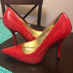 Classified red heels